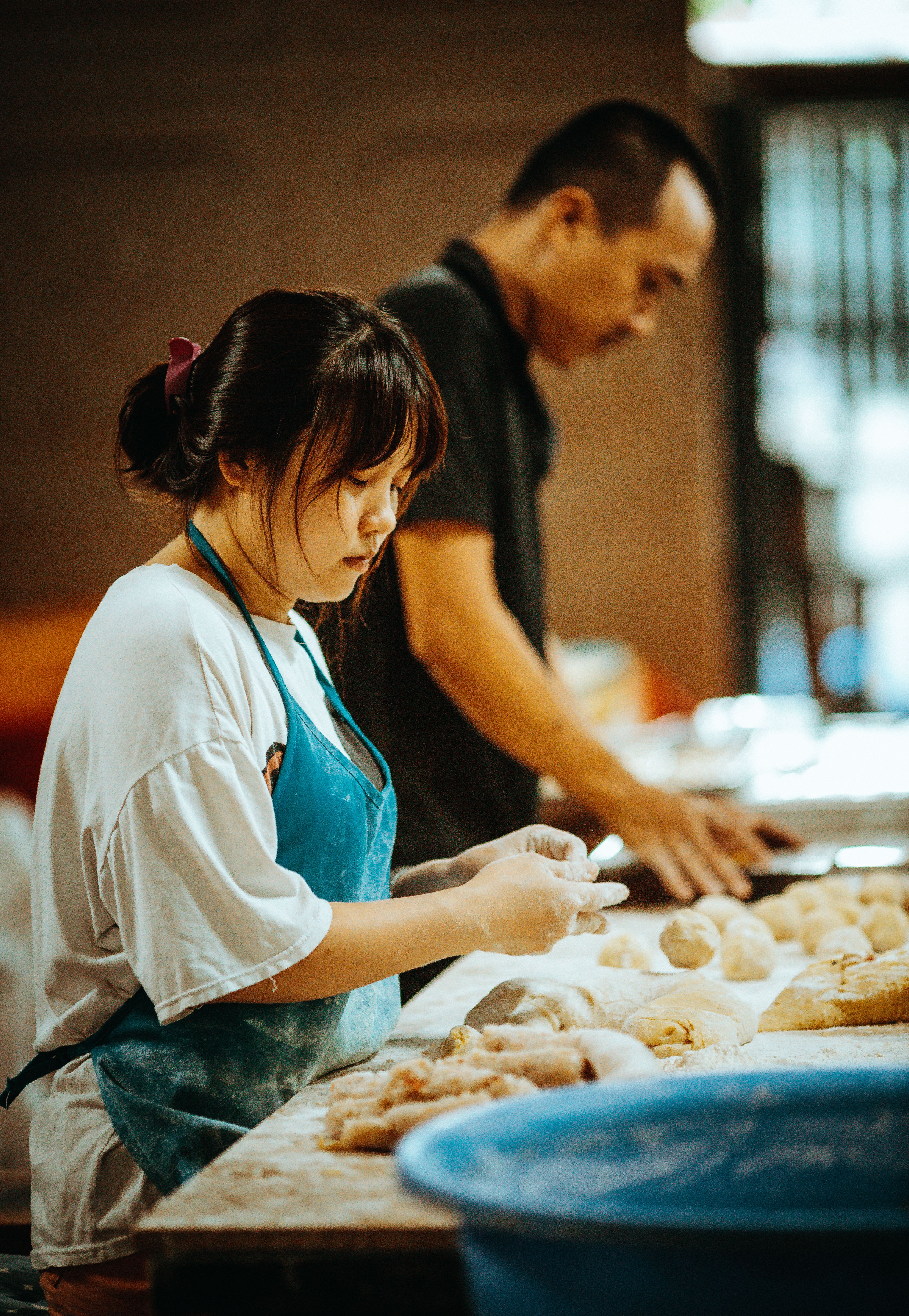 Baker preparing fresh pastries